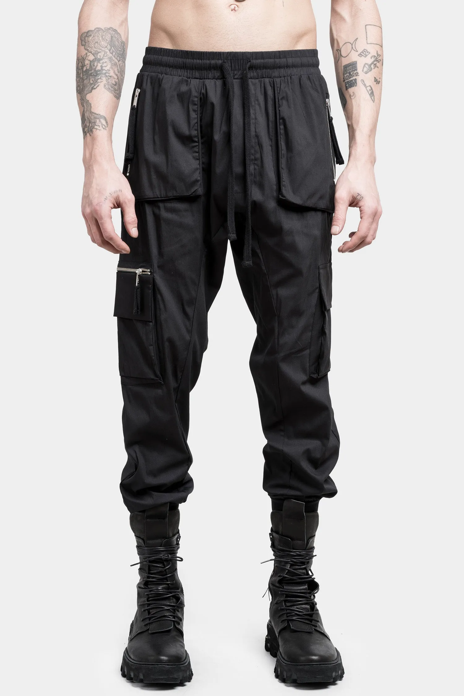 Black cargo pants with zip pocket.