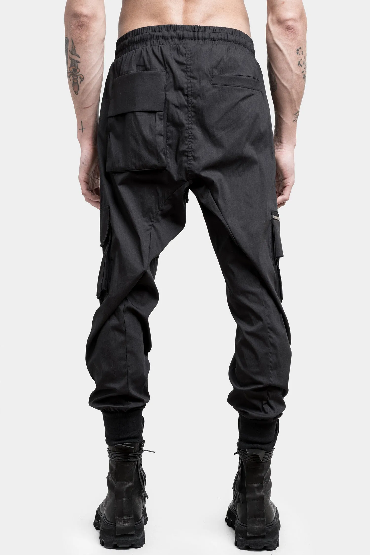 Black cargo pants with zip pocket.