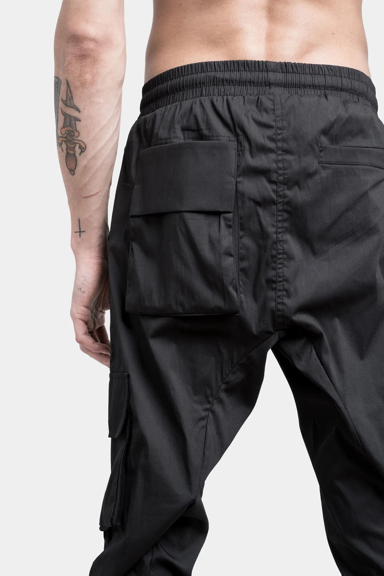 Black cargo pants with zip pocket.