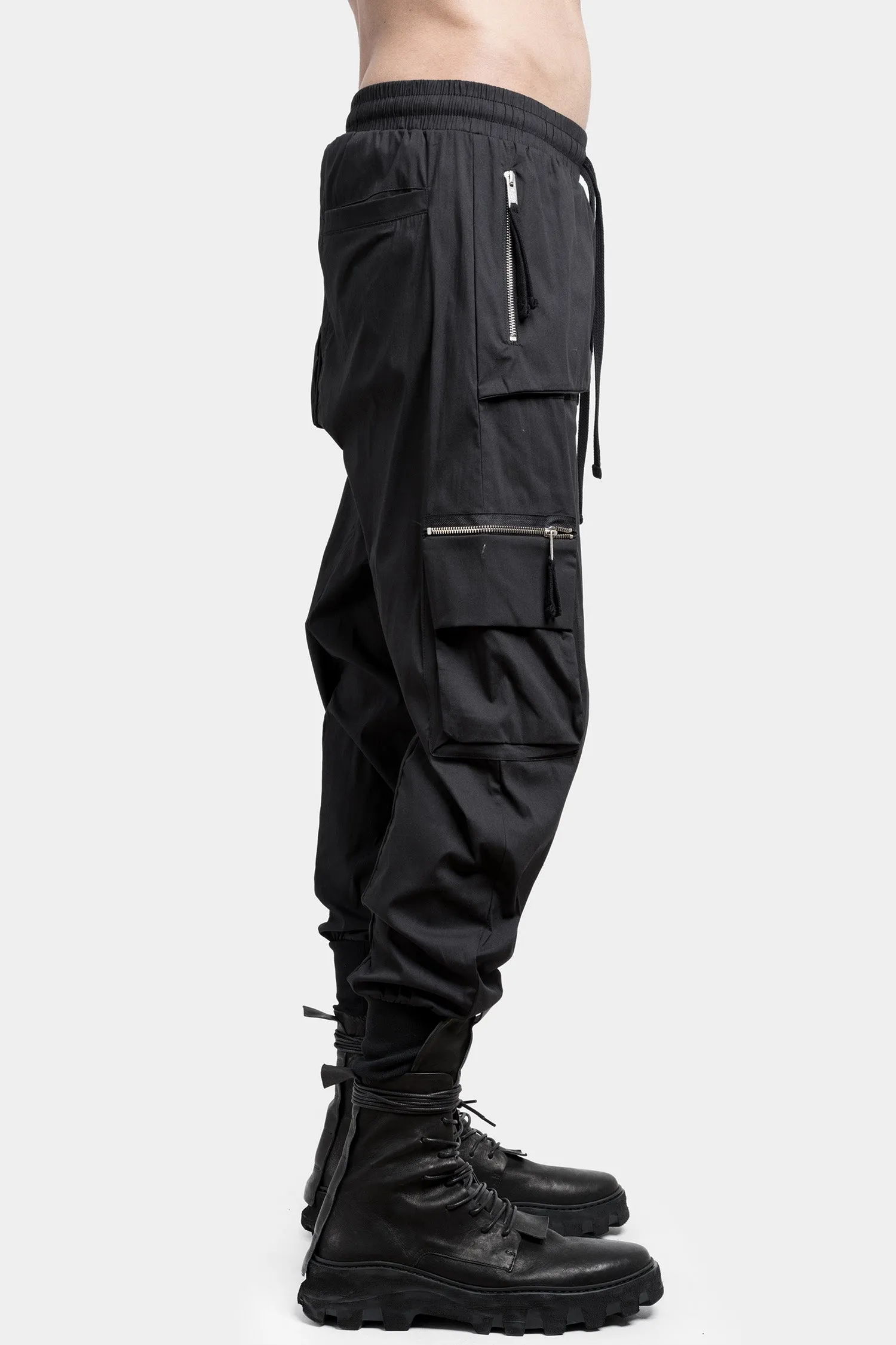 Black cargo pants with zip pocket.