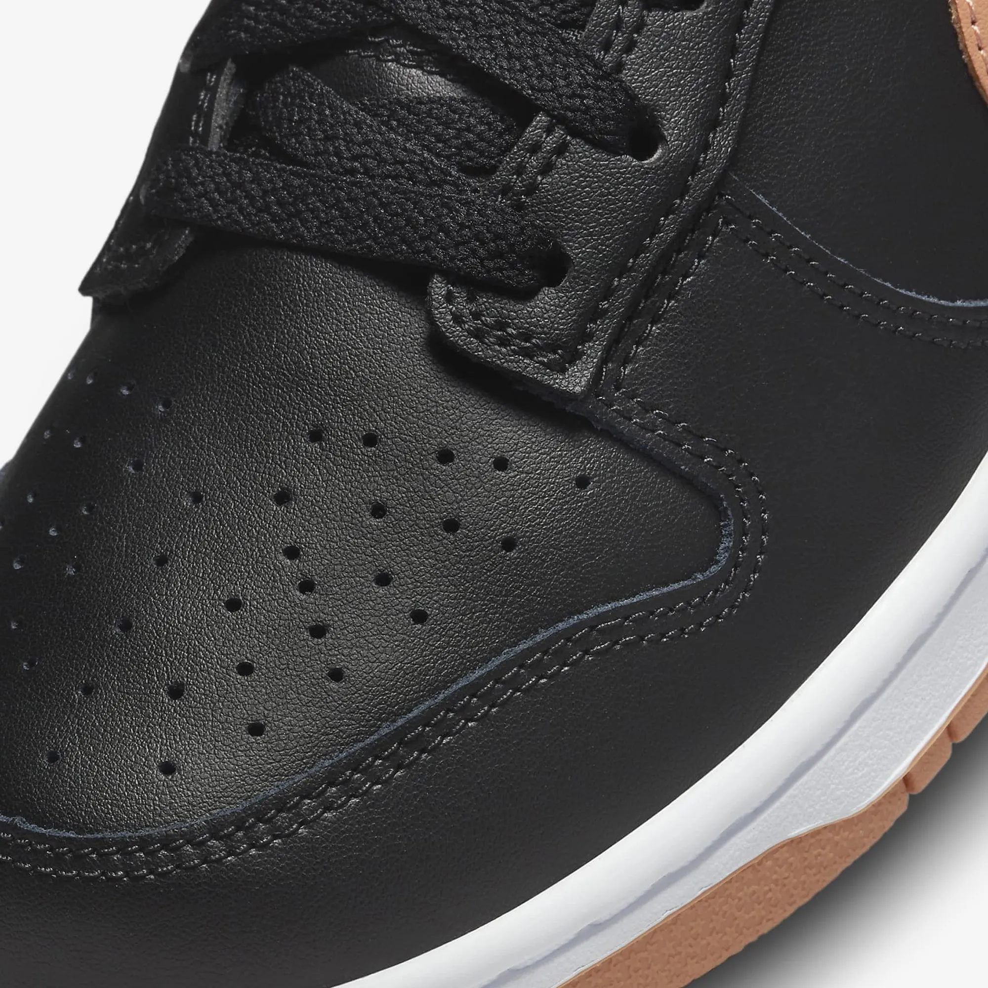 Dunk Low Retro in Black and Amber Brown - Classic Black and White Sneakers.