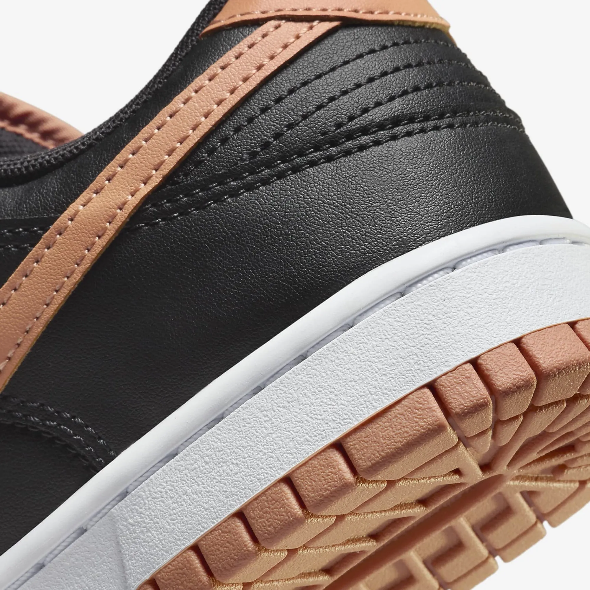 Dunk Low Retro in Black and Amber Brown - Classic Black and White Sneakers.