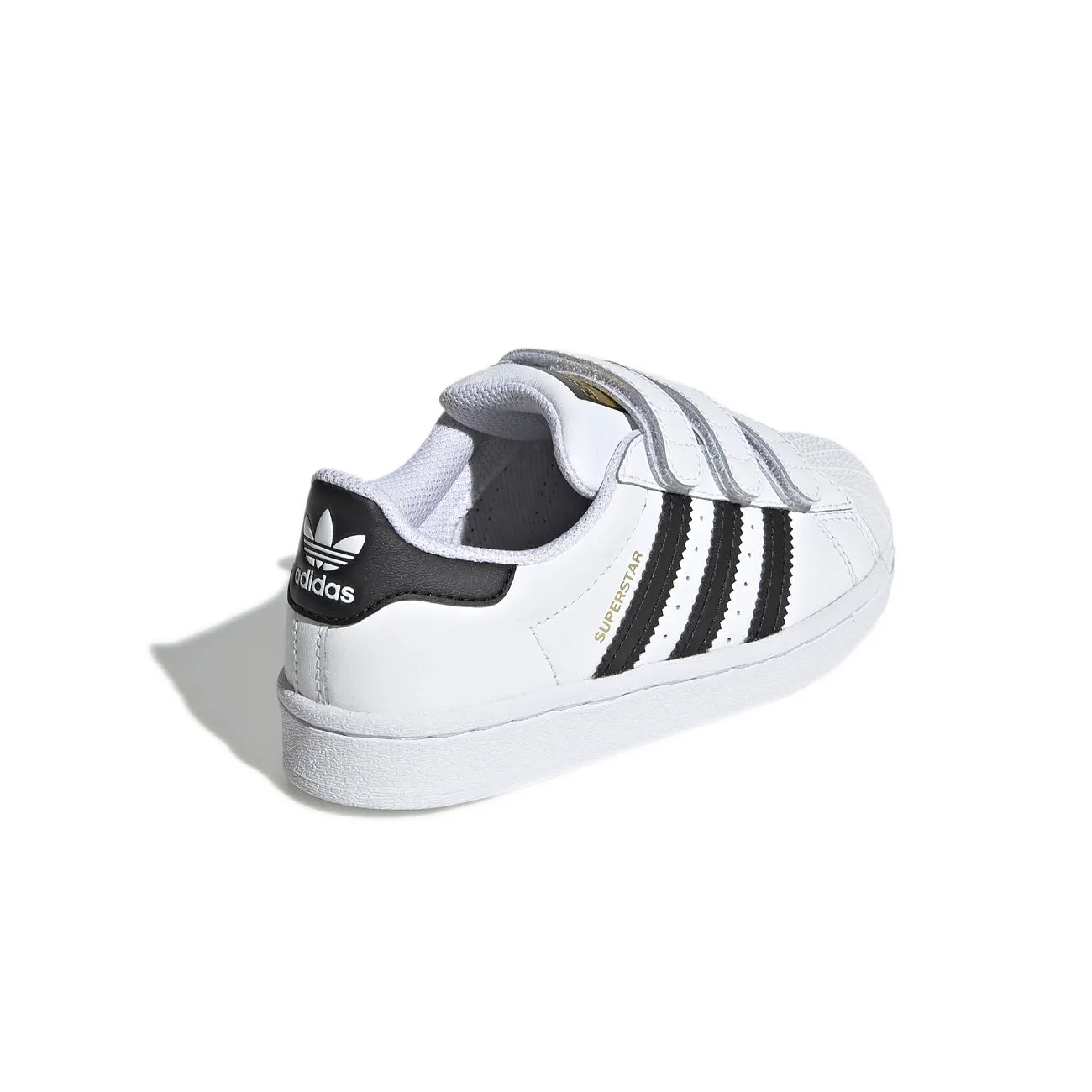 Kids white black sneakers.