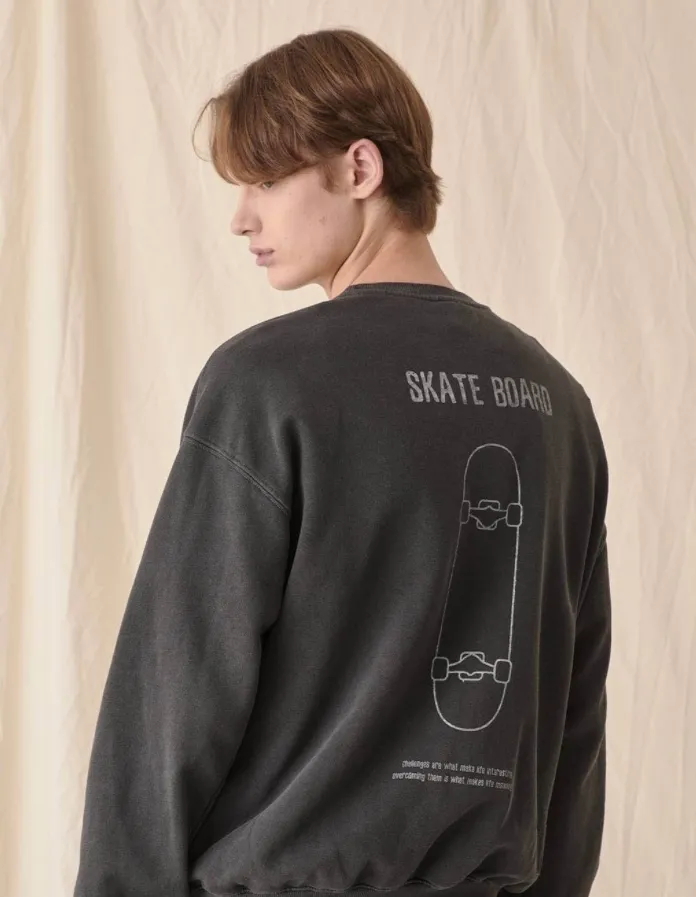 LE2 Jungkook BTS Pigment sweatshirt with skate board design